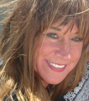 Portrait of Kay Deaki, Realtor.